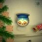Mobile Preview: Christmas decoration windlight for Christmas on stand foot motif winter village green, blue, or red, series Lauscha Christmas