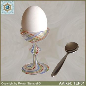 Egg cup from crystal clear colorful striped glass