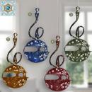 Wind light glass ball colored with white pattern and curved handle for hanging